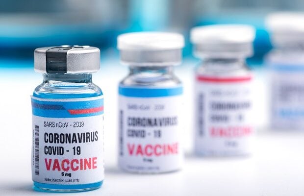 virus vaccine development of a coronavirus covid 19, vaccine bottle in concept of insurance and fight against coronavirus 2019 ncov cure, medical research in laboratory to stop the spread of the virus