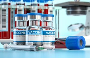 covid 19 coronavirus vaccine with blood test and microscope