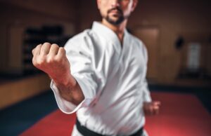martial arts, fighter in white kimono, black belt
