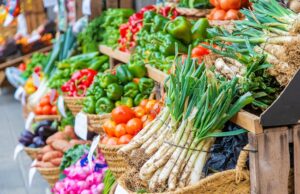 market stalls with vegetables and fruits. selective focus.