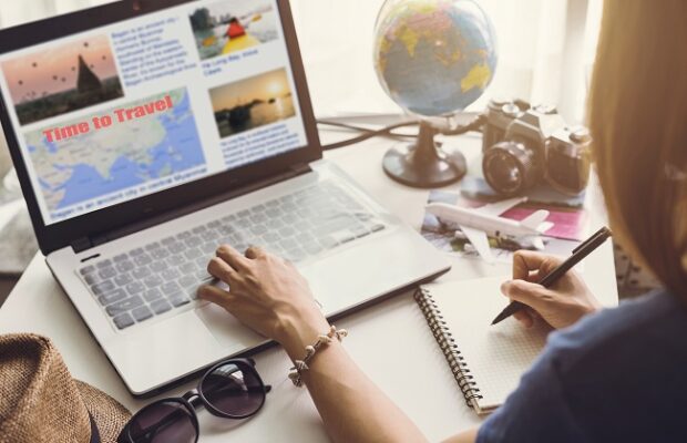 young women planning vacation trip and searching information