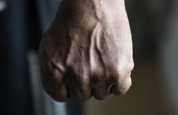 closeup of a black hand in fist
