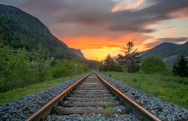 railroad tracks in the setting sun
