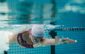 female athlete swimming in pool