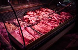 a butcher shop's full filled meat window