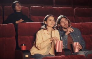 happy couple having date in the cinema