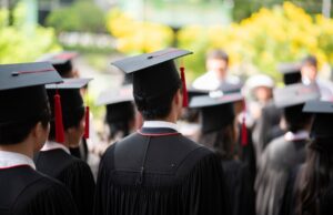 row of university graduates