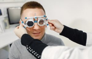 man doing eye test checking examination at ophthalmology center
